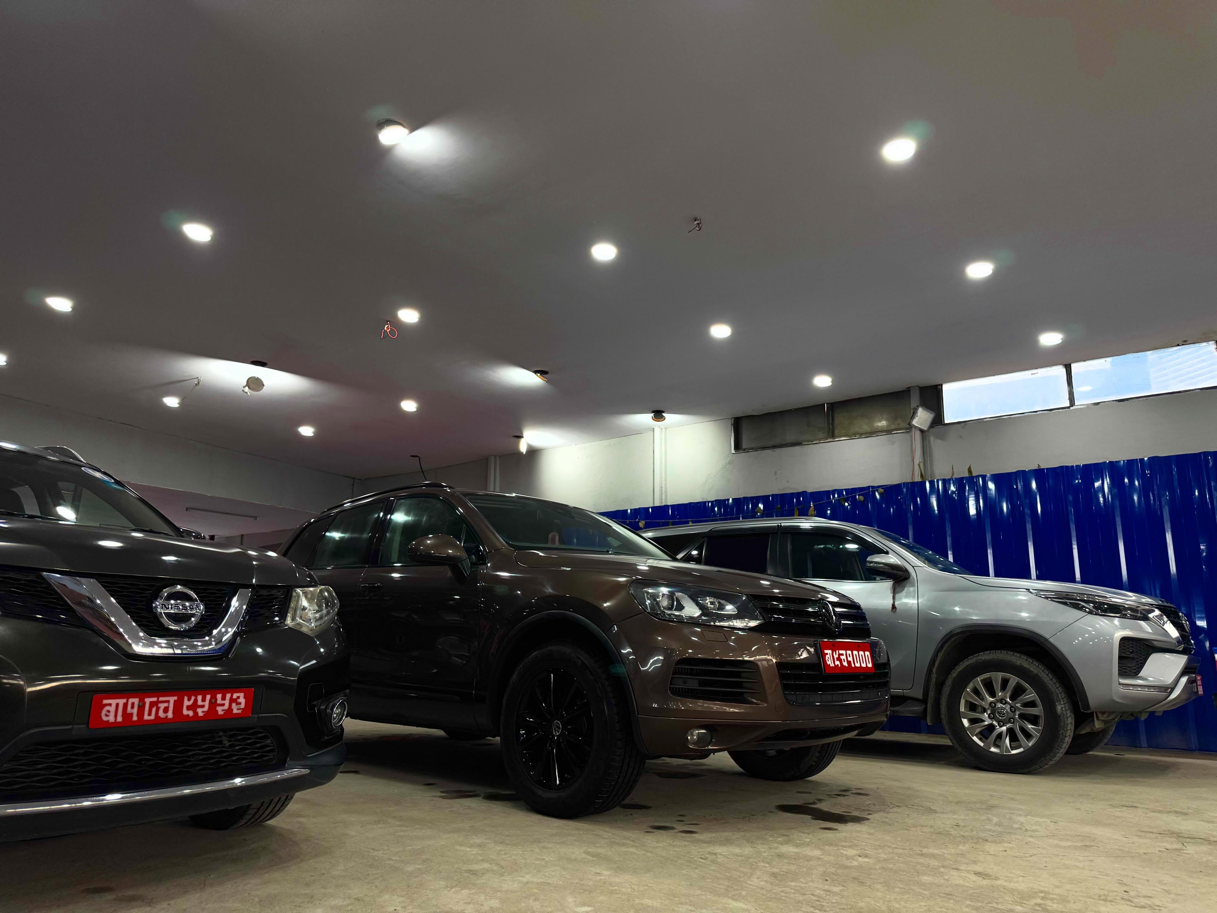 Automotive workshop bay with tools and equipment